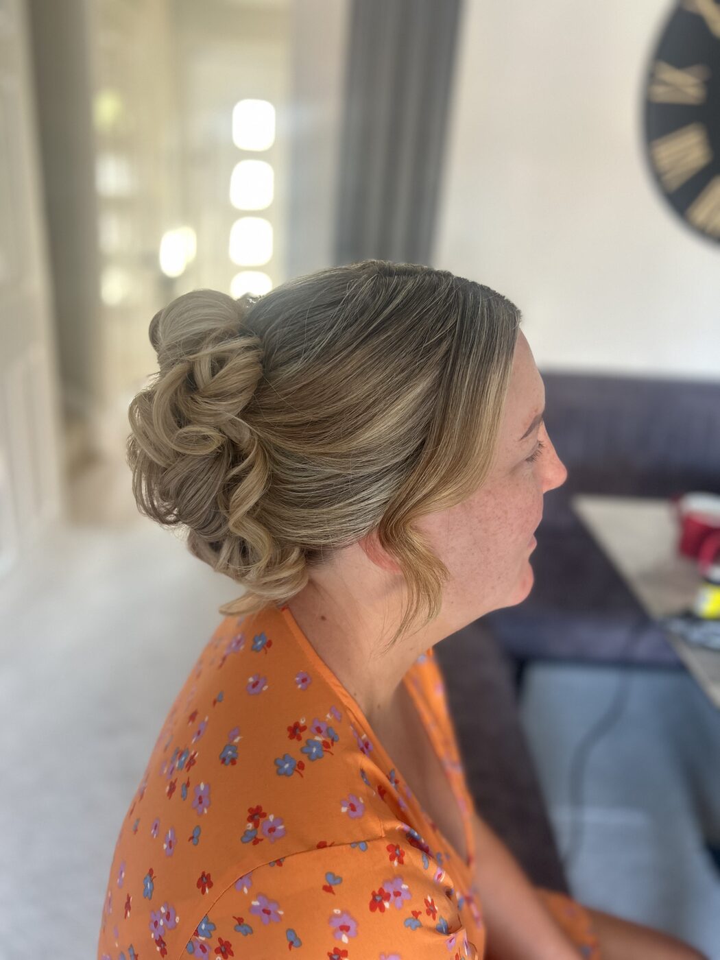 Dressed low bun bridal hairstyle by Memories by Taylor